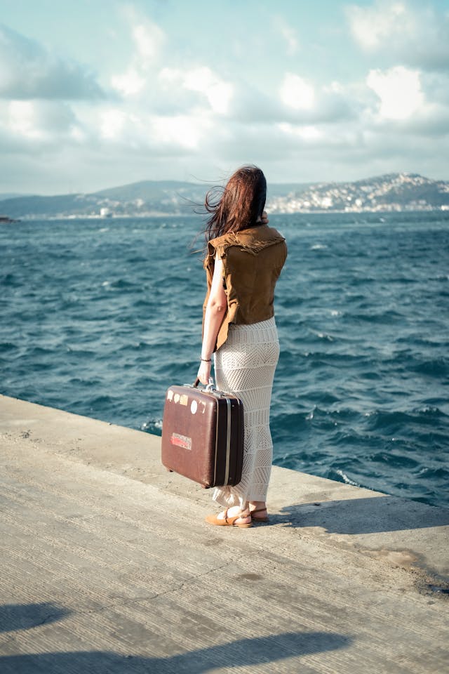 Person with suitcase moving to another EU country